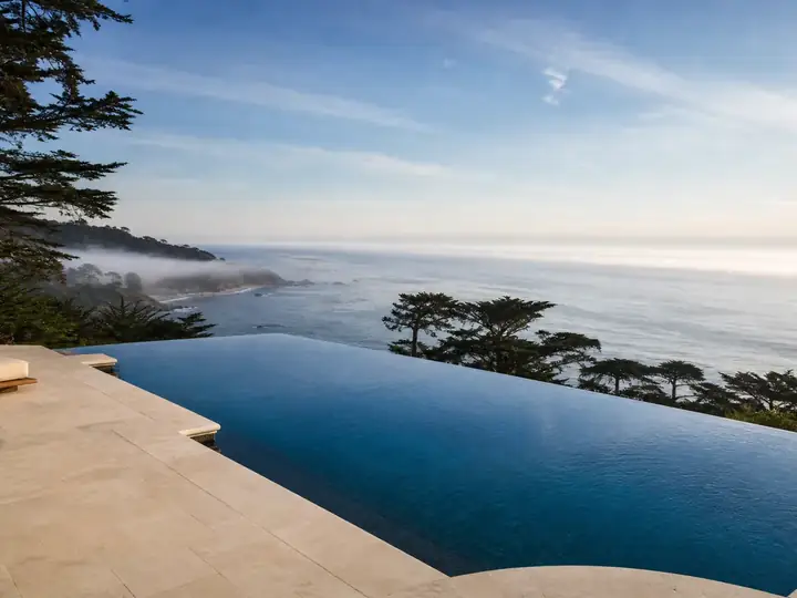 Infinity-edge hillside pool overlooking the coast
